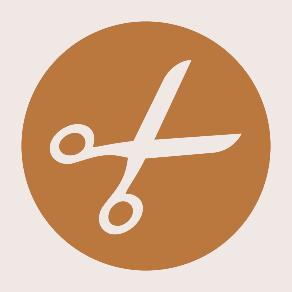 un logo représentant des ciseaux de toilettage
